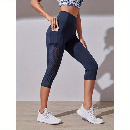 Legging de sport court taille haute avec poche latérale, coloris Bleu marine